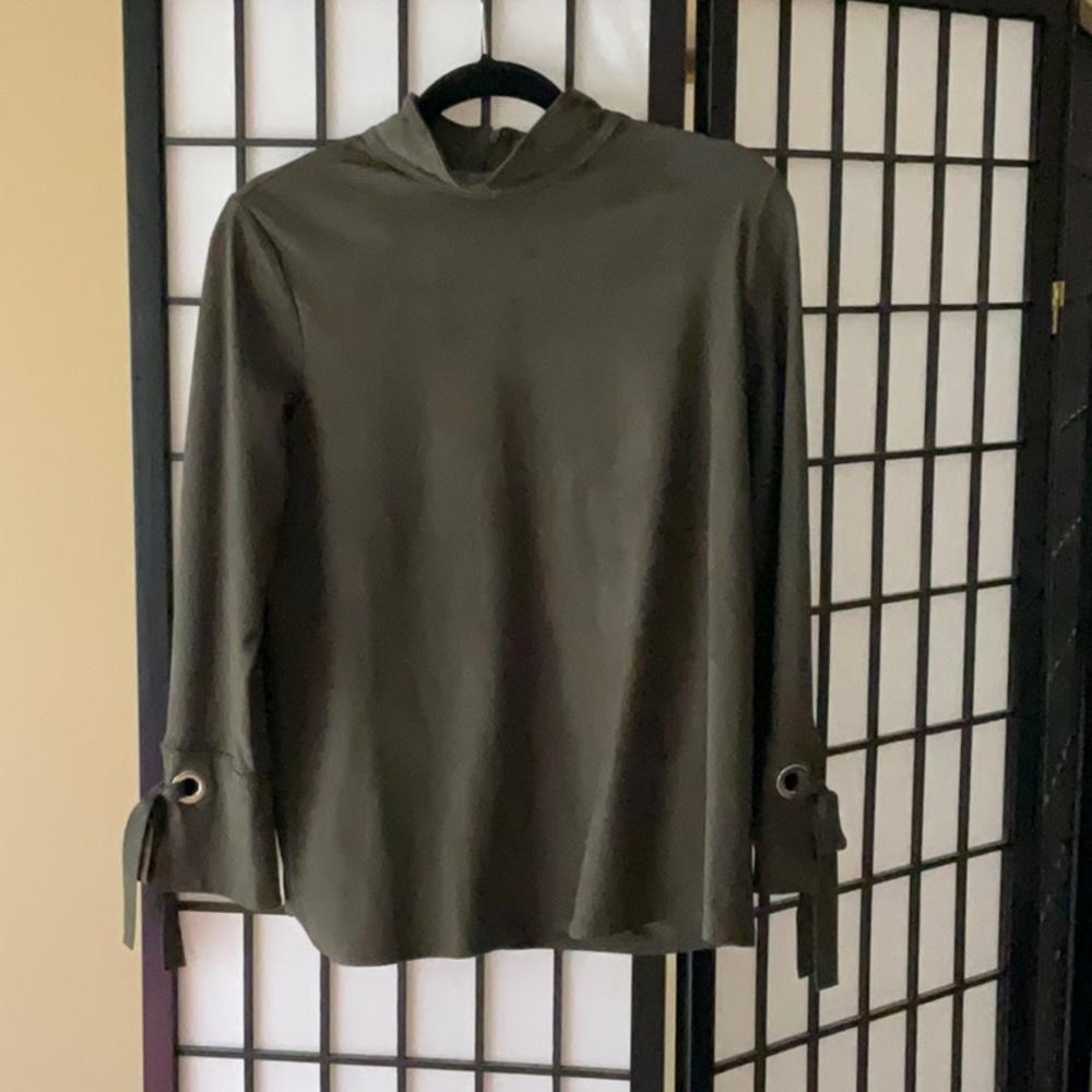 Live green suede top. It’s a size one in Chicos